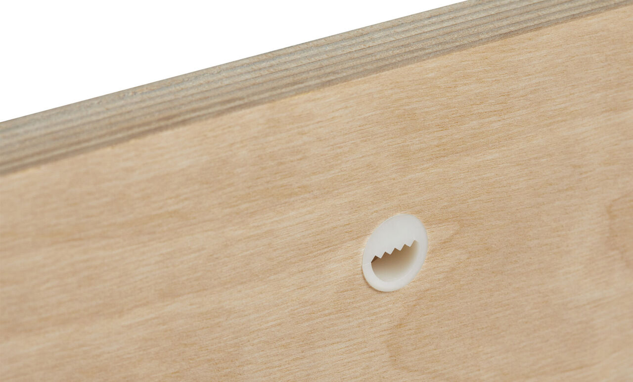 Fond en bois avec un trou pour fixation murale.