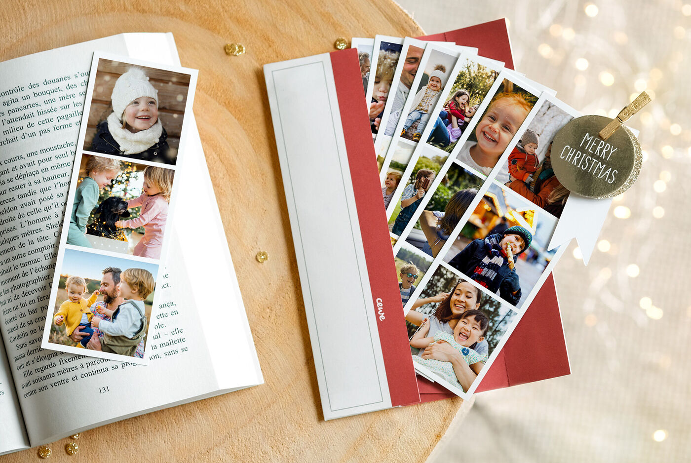 Une page de livre ouverte montre de belles photos et une carte cadeau 'JOYEUX NOËL'.